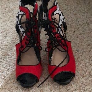 Red suede pumps with polka dot sandals